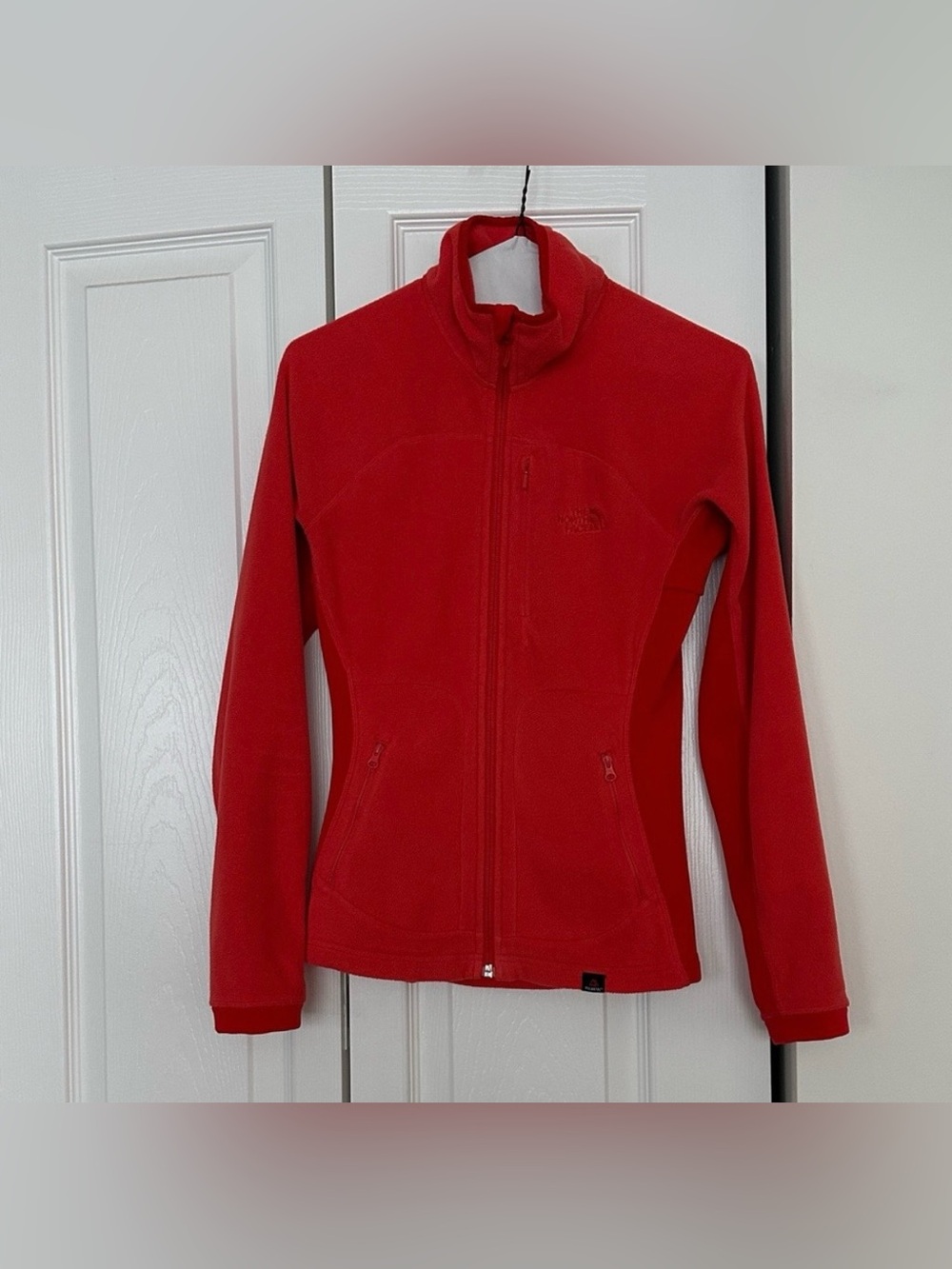 THE NORTH FACE ORANGE
WOMENS POLARTEC FLEECE JACKET SIZE
XSMALL